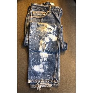 Levi’s distressed “505” jeans. 36W, 30L.